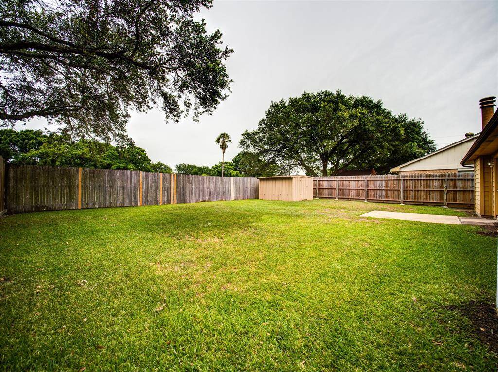 Large backyard, perfect for outdoor activities.