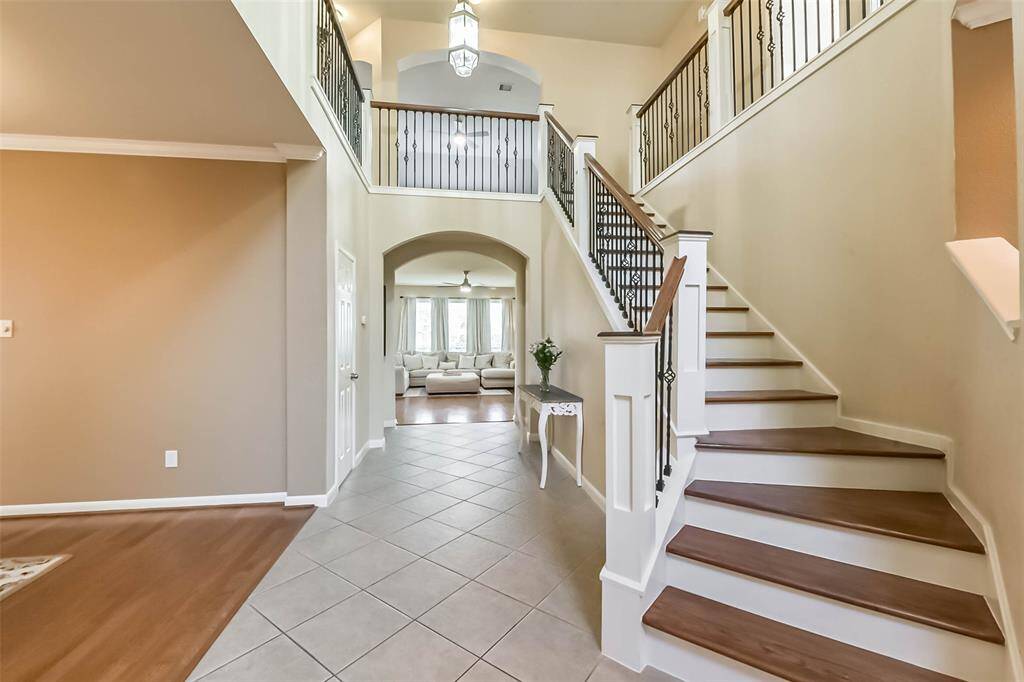Head upstairs to the game room, media room and 3 bedrooms.