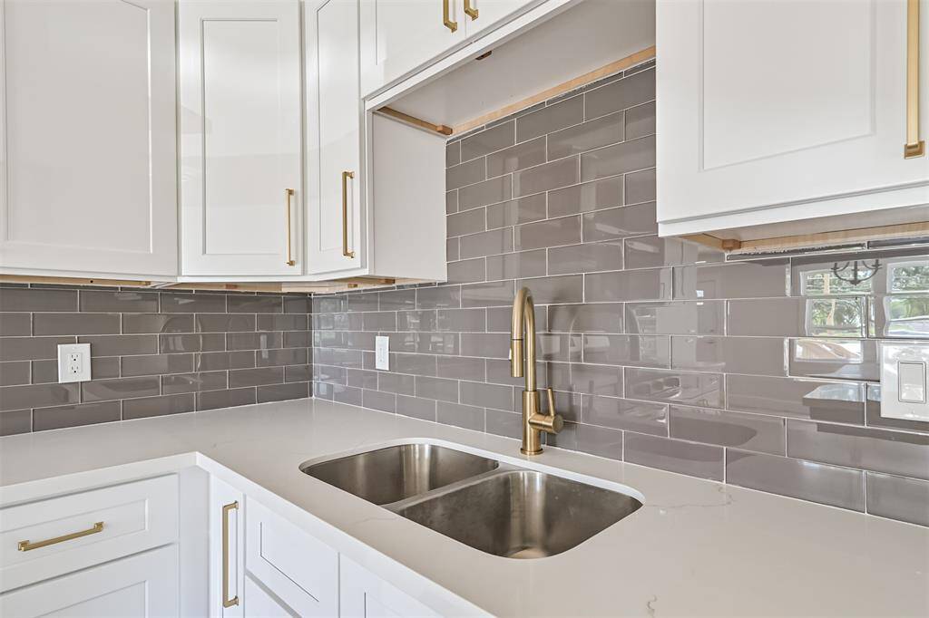 Gold pulls and faucet accents