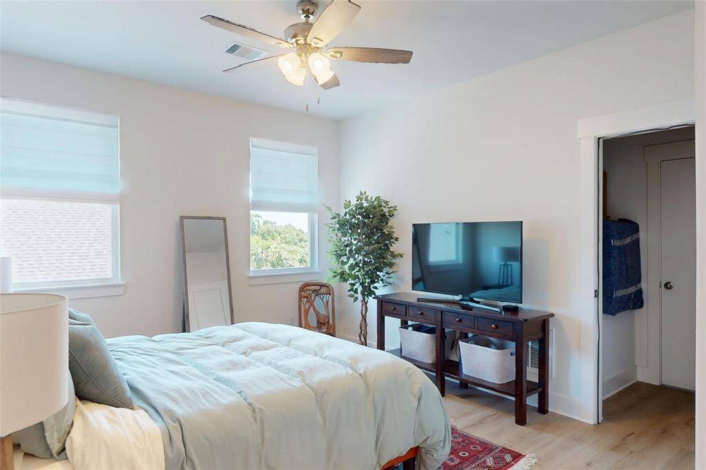 Secondary Bedroom #3, located upstairs with an en suite full bathroom.