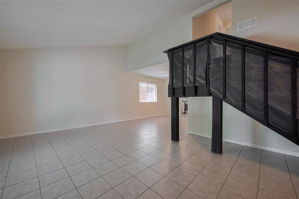 Front room can be a formal sitting room, extra tv room, play room, or home office! Virtually staged.
