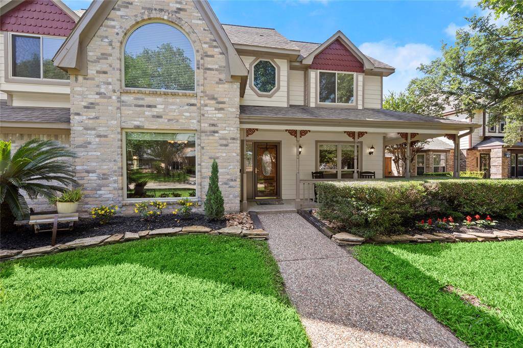 As you approach this inviting wrap-around front porch, you are met by the beauty of lush grass, stacked flagstone, mature shrubbery, pops of reds and yellow flowers, sparkling windows and the vibrant, professionally painted siding and trim. Extra details like the meticulously painted, scalloped shingles above each upstairs, gabled window, the matching paint of the scrolled brackets and the contrasting colors of the siding, porch columns and railings make this home a breathtaking showplace.