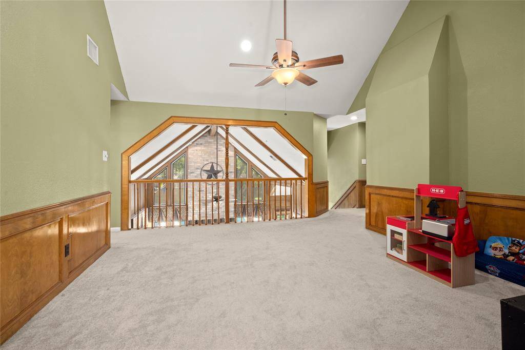 This is another view of the gameroom looking out to the family room.  It is even possible to be in the playroom and look through the family room windows to see into the back yard.