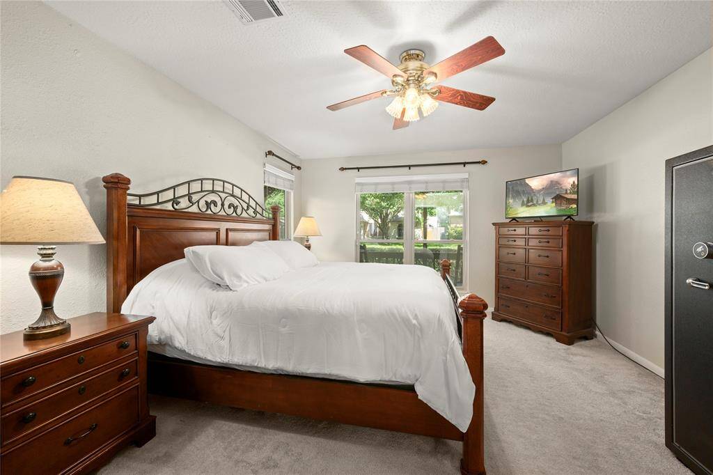 The new owners can enjoy the view from either one of the large double paned windows that look out onto their exceptionally large wrap around front porch. This room is perfectly suited for this sizeable bedroom set.