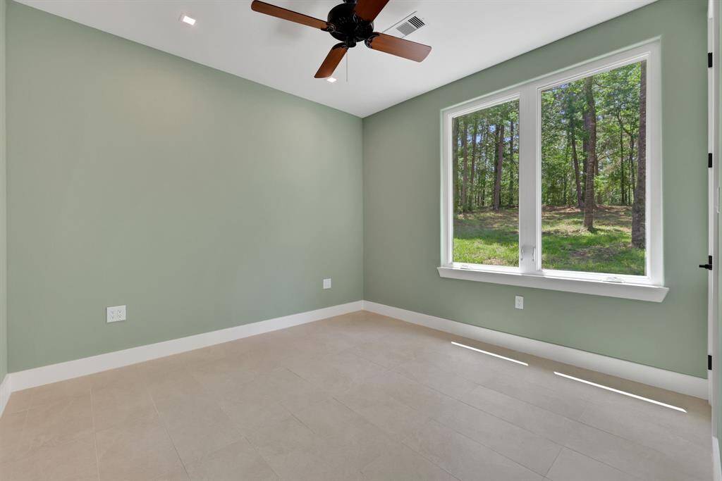 The guest bedrooms are located on the other side of the home, providing privacy for guests