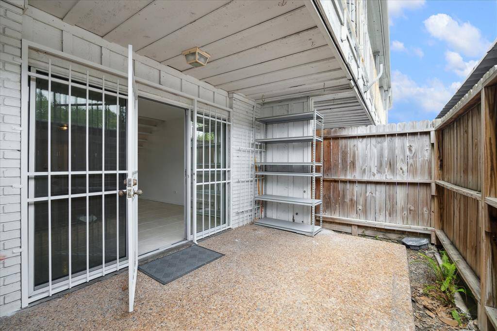 Back downstairs, a nice-sized private patio sits off of your living area with gated access to your assigned, covered parking spot.