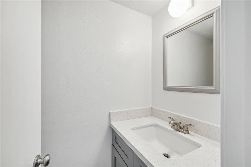 A conveniently located powder bath sits on the first floor.