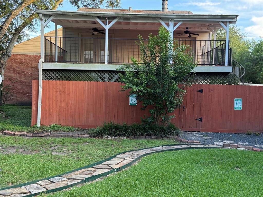 View of the home with Decks