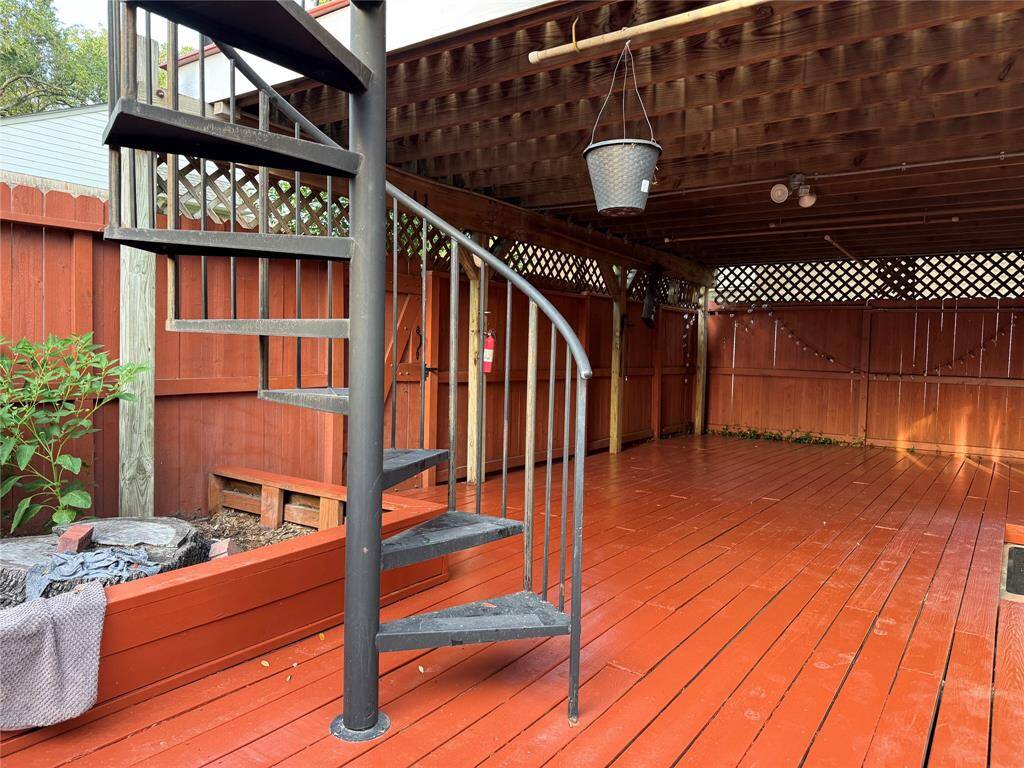 Downstairs Gated Patio deck with access to the 2nd floor deck
