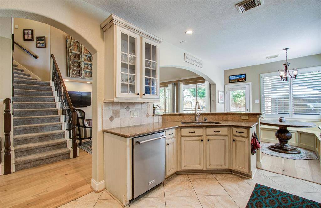 Stunning floor plan shows the flow from upstairs to downstairs and this amazing kitchen space!