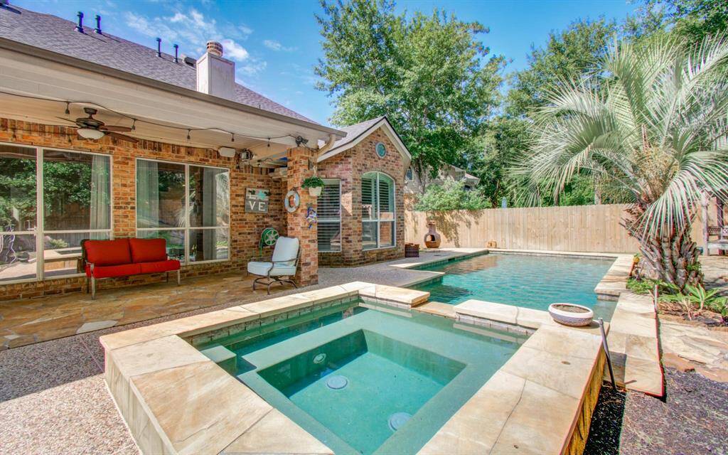 Enjoy a modern sparkling pool and spa in your extremely private backyard.