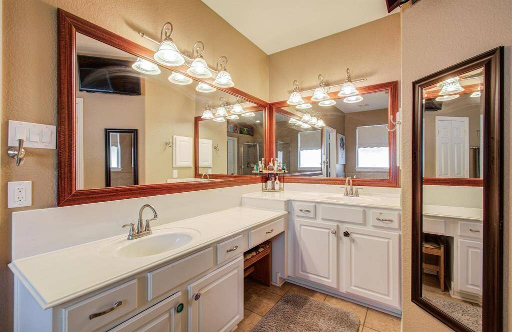 Enjoy a vanity area and large walk in closet in the primary bath.