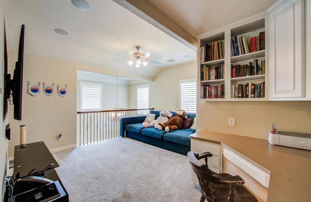 Check out this large game room with built ins upstairs!