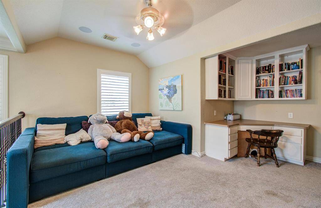 Another view of this spacious game room upstairs that overlooks the entry downstairs.