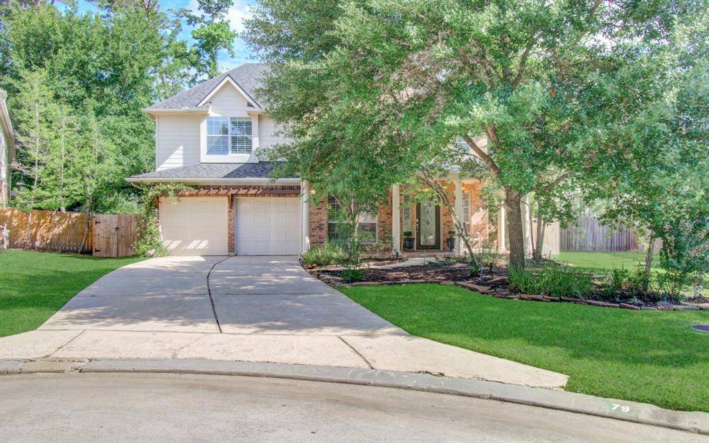 Oversized driveway with ample extra parking for guests.