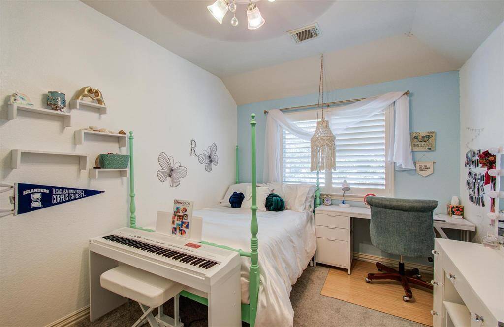 One of 4 secondary bedrooms upstairs.