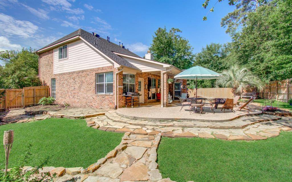 Extra side yard space for play outside in this incredible backyard space.
