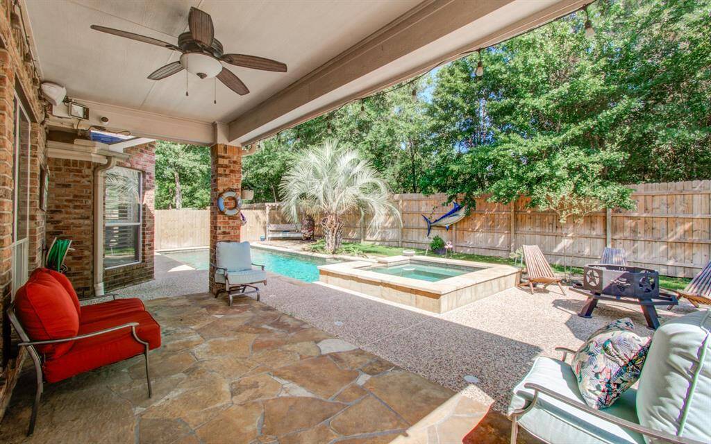 Extra side yard space for play outside in this incredible backyard space.