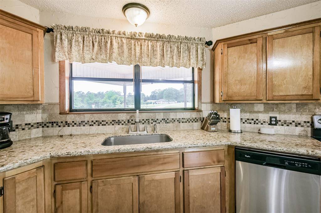 A beautiful view overlooking the property while washing dishes!