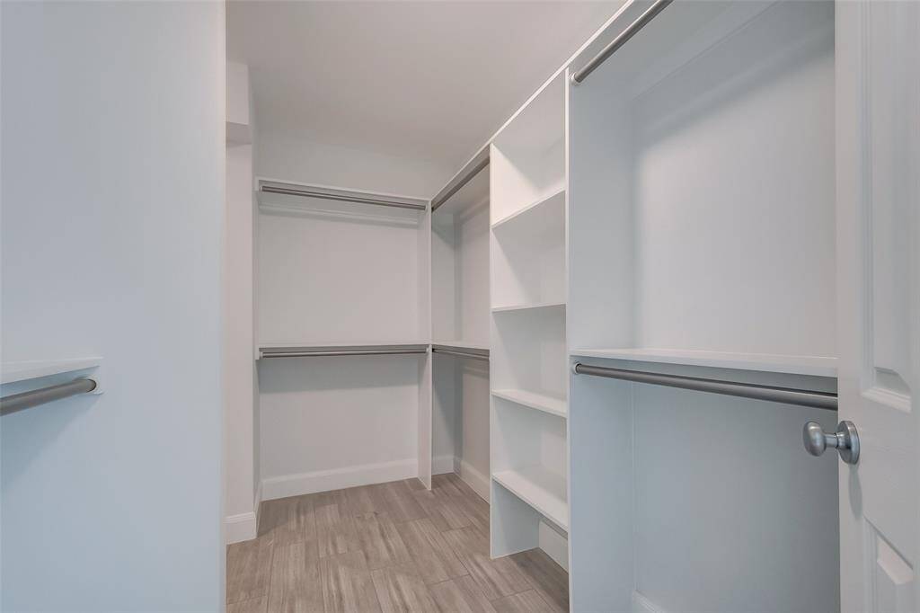 Custom made super spacious master closet.