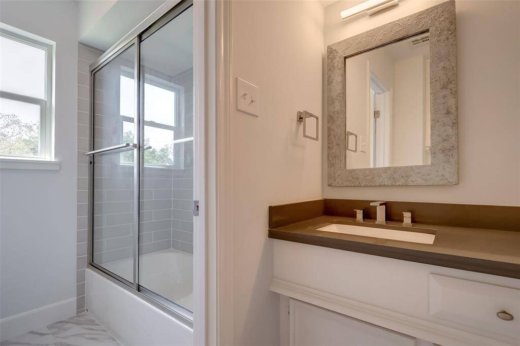 Other view of the bathroom and it's beautiful shower/tub.