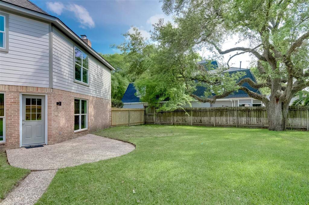 View of the backyard and it's patio space.