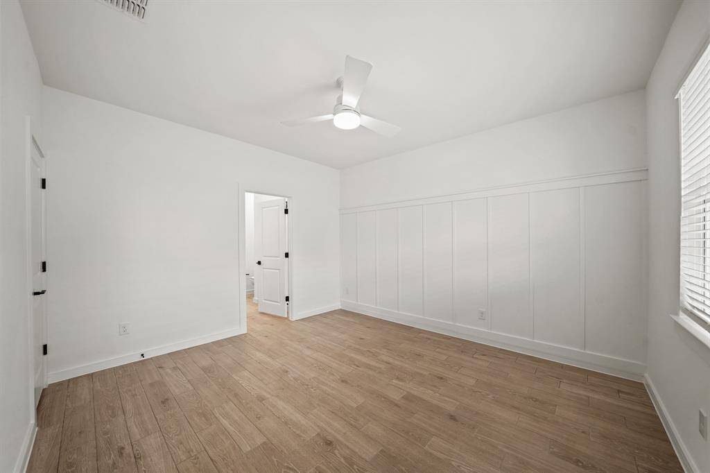 Private primary suite with feature wall (*Photo not of actual home and used for illustration purposes only.)
