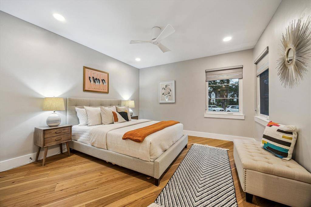 All 4 bedrooms are nicely sized with recessed lighting, dimmers, new ceiling fans, and warm hardwood flooring.