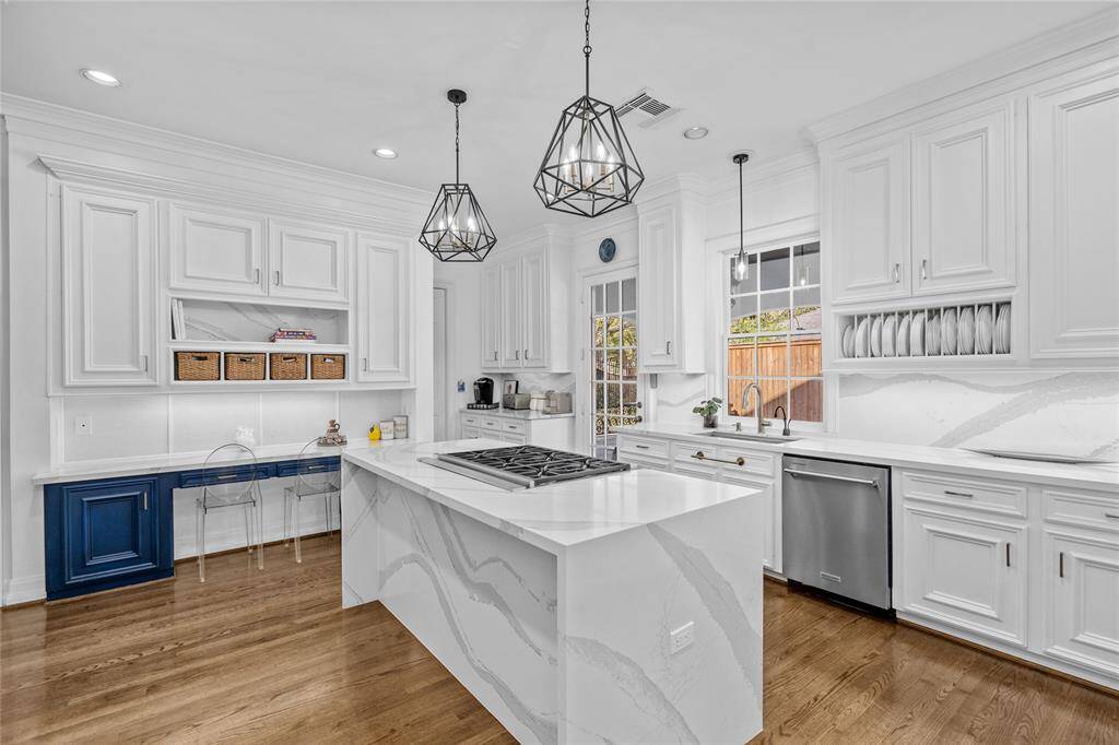 Gourmet kitchen updated in 2019 with Silestone quartz countertops, top-of-the-line stainless steel appliances,& Sub-Zero refrigerator.