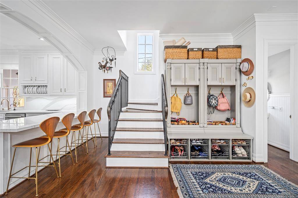 Second staircase off of kitchen near breakfast room and garage entrance
