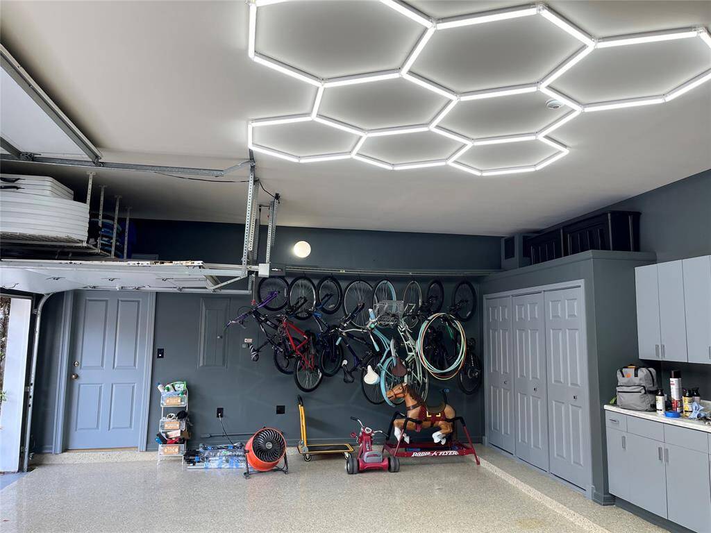 Remodeled 3 car garage and door to second 2 car garage