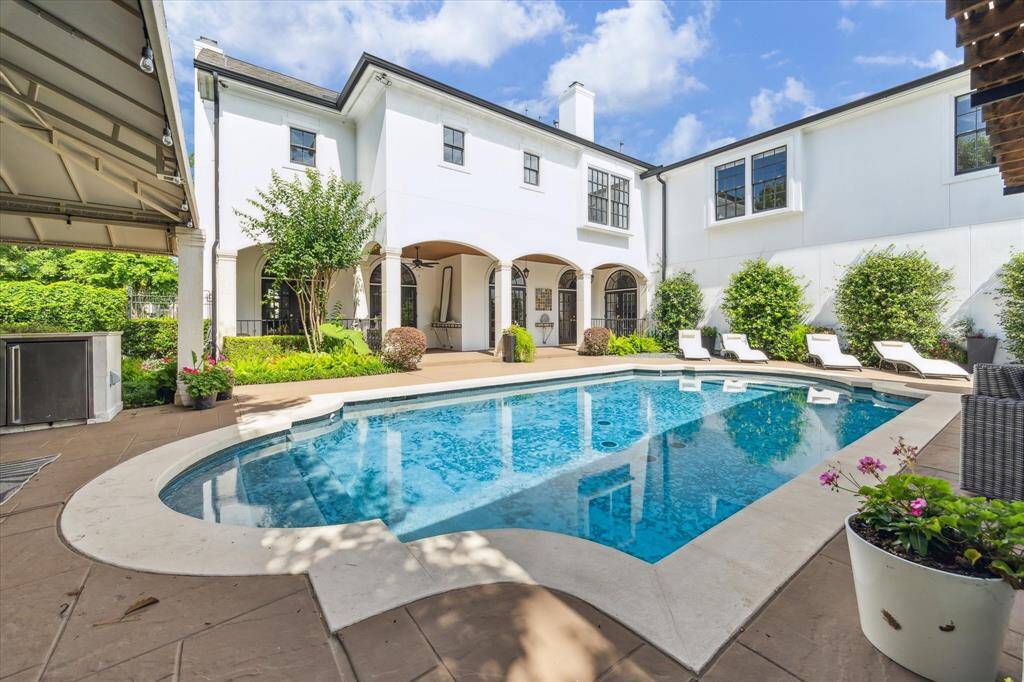 Beautiful heated pool; view from outdoor kitchen and view of loggia