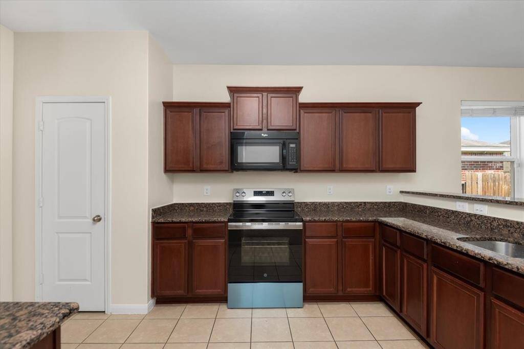 Kitchen with new range.