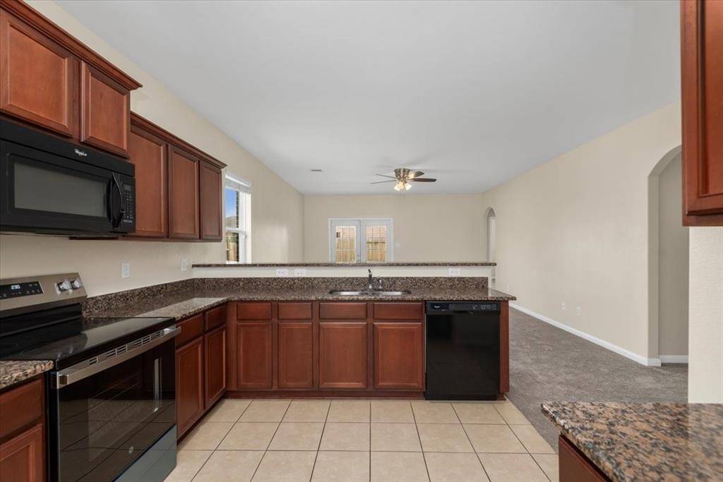 Kitchen opens to the living area.