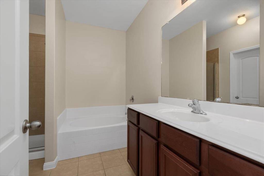 Primary bathroom with double sinks.