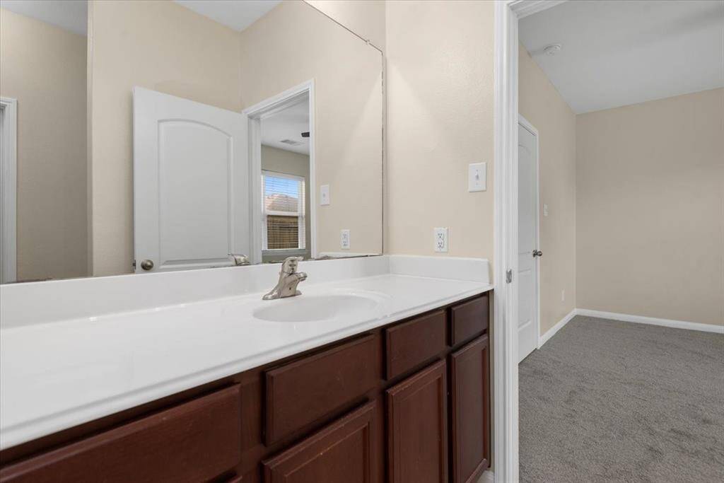 Large vanity in primary bathroom.