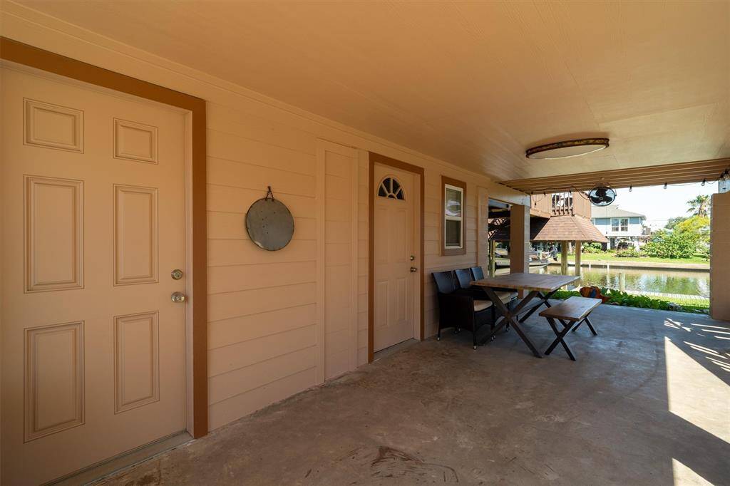 The downstairs open bay has plenty of room for outdoor furniture and entertaining