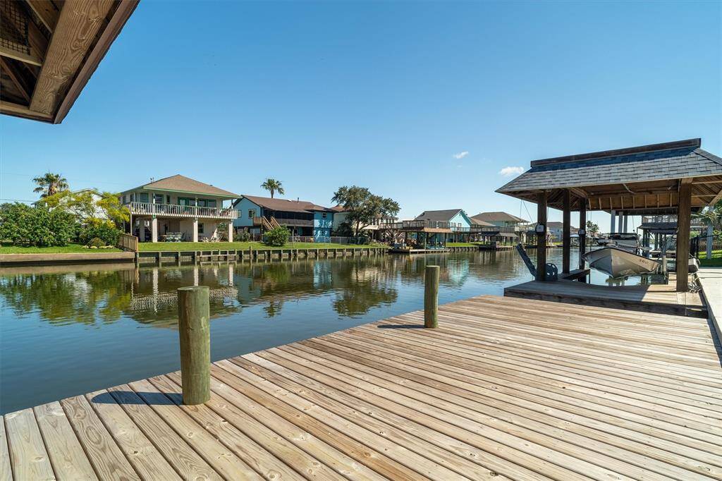 Wow! This oversized dock has plenty of room for fishing, crabbing, kayaking, swimming, and putting furniture out here for evenings on the water