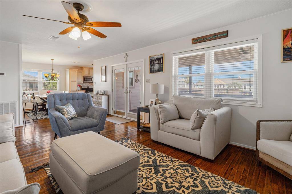 View of the open concept from the living area into the kitchen/dining areas
