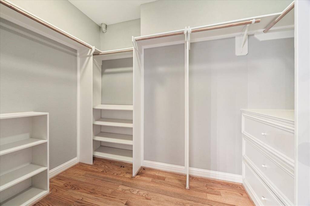 Third floor: The oversized walk-in closet offers an abundance of space to keep everything organized and within reach. Thoughtfully designed with custom built-ins, it includes multiple shelves, drawers, and hanging areas to accommodate everything from seasonal wardrobes to shoes and accessories. Whether you're storing everyday essentials or curating your favorite outfits, this well-appointed closet combines function, style, and convenience.
