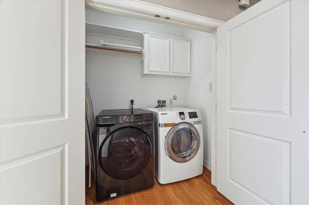 Third floor: The laundry room is conveniently situated between the two third-floor bedrooms and features stylish built-ins that add both function and storage to your daily routine.