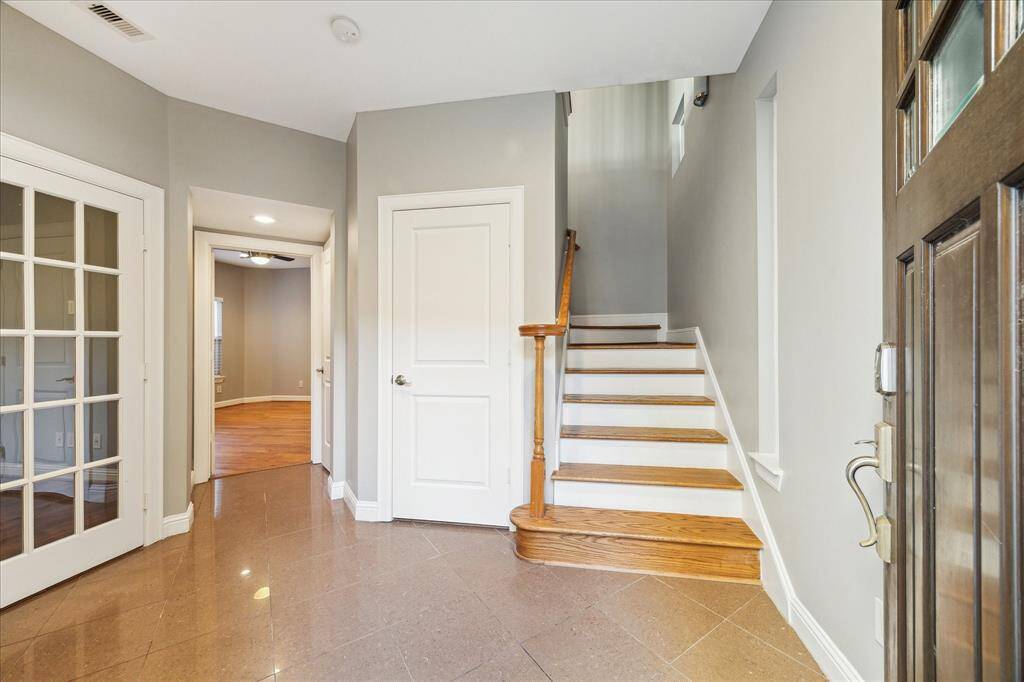 First floor: The spacious foyer leads to the two downstairs bedrooms. The door in the middle is a large closet, which is also elevator ready.