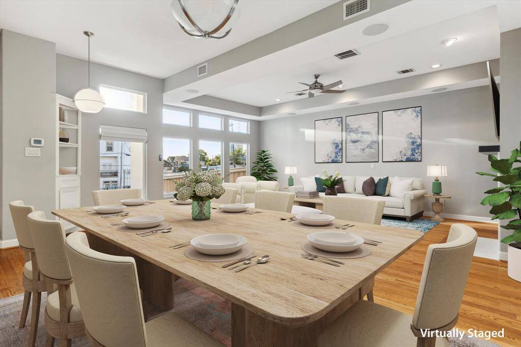 Second floor: The spacious dining area easily accommodates large furniture and is bathed in natural light, creating a warm and inviting atmosphere.