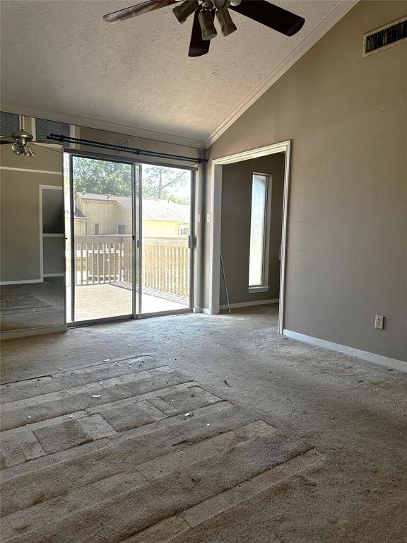 Primary room's view to balcony and private en suite
