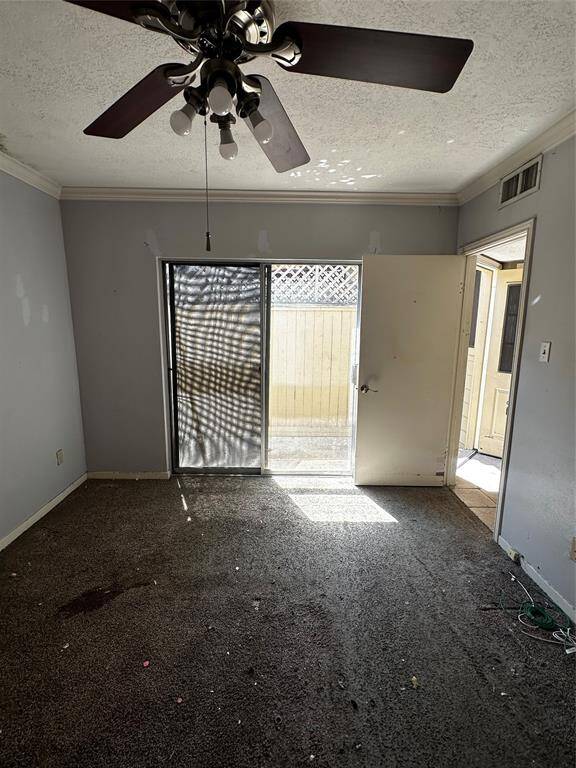 Secondary bedroom with entrance to private courtyard