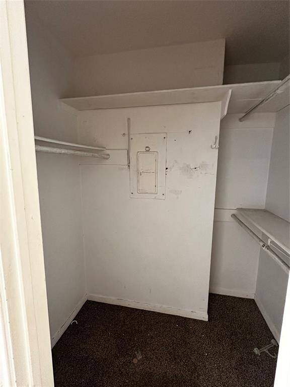 Walk-in closet in secondary bedroom