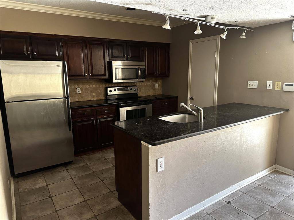 Kitchen with granite countertops