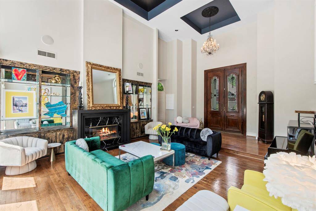 Formal living arear with soaring ceilings and tons of natural light flowing into this perfect entertaining room.