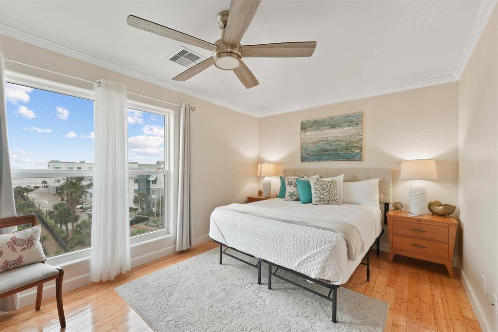 Wake up to ocean views in this tranquil primary suite, designed with relaxation in mind.