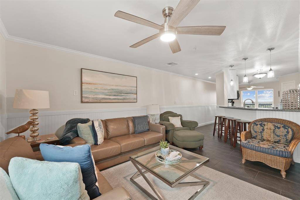 This expansive layout combines comfort and functionality with clear sight lines to the kitchen and breakfast bar.